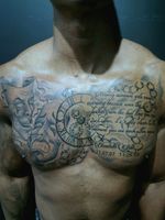 Full chestpiece done over 2 sessions, part healed.  #chestpiece #clock #script #chest #chesttattoo #masks #cogs #chain 