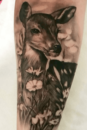 Black and gray deer I did. I love animal tattoos!! 