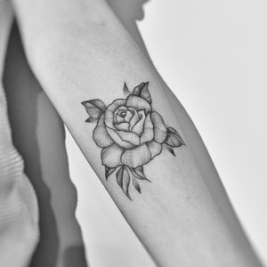 Lines and dot shading rose.Tattooed by me