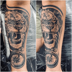 Lion with clock tattoo