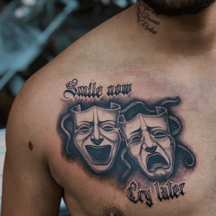 Smile now cry later tattoo de Kovalero #Kovalero #smilenowcrylates #blackandgrey #masks #dramamasks #chicano #illustrative #oldenglish # letters # chest