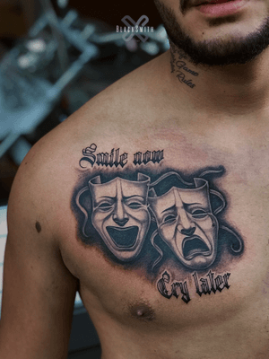 Smile now cry later tattoo by Kovalero #Kovalero #smilenowcrylater #blackandgrey #masks #dramamasks #chicano #illustrative #oldenglish #lettering #chest