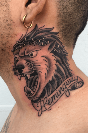 Lion head on the side of the neck 