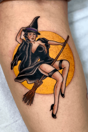 Witch on her broomstick on the calf 