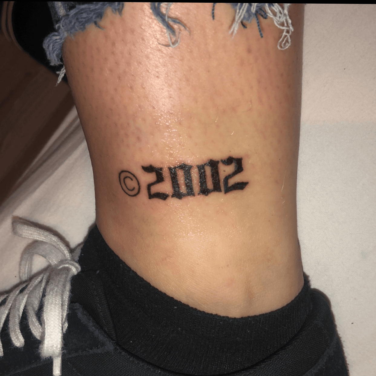 Moms birth year on the front part of my ankle I over estimated my  flexibility and this turned into the most stressful yoga session ever   3rl  rsticknpokes
