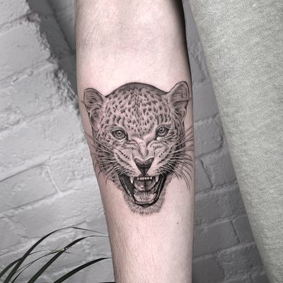 leopard head tattoo
