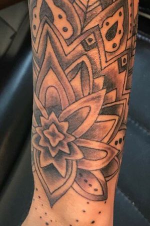 Outer arm view of mandala artwork on left forearm 