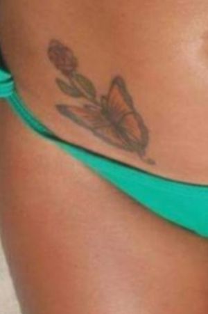 First tattoo done on my 18th birthday. Very clique white girl tattoo on my right hip. This is a zoomed in picture and obviously is in better quality in person.