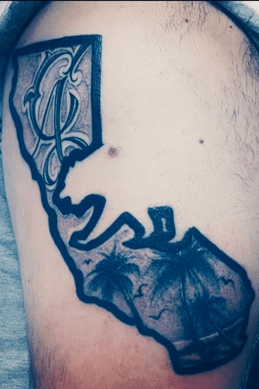 Single needle California Map tattoo on the upper arm