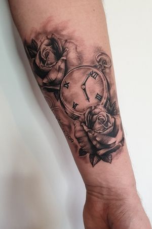 Black and grey roses and pocket watch