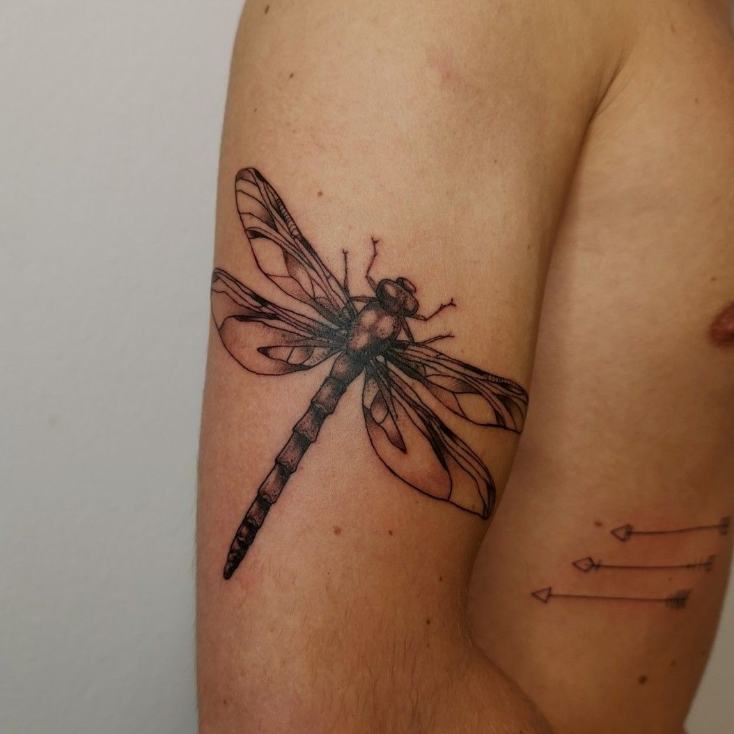 Mother and daughter matching dragonfly tattoos
