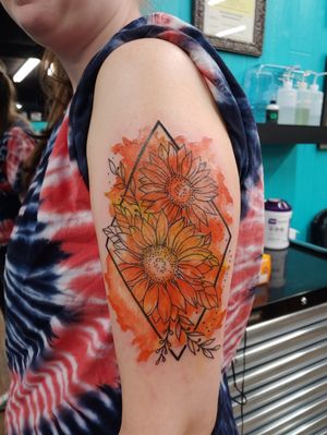 Watercolor Sunflower tattoo done by Morguen at Addictions in Ink