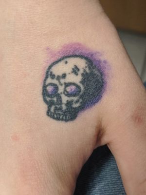 Old fashioned skull with purple highlights