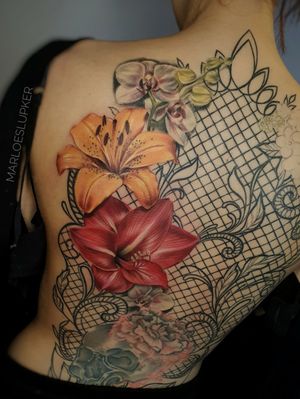 Work in progress! Tiger lily & Amaryllis are fresh, linework and orchids are healed #flowertattoo #lacetattoos #floraltattoo #backpiece #laceback #backtattoo #tigerlily #lilytattoo #amaryllis #sexyback #marloeslupkertattoo #marloeslupker #amsterdam #amsterdamtattoo #inkandintuition #tattooart #tattooartist #colorrealism #colortattoo #colorrealismtattoo #realismartist 