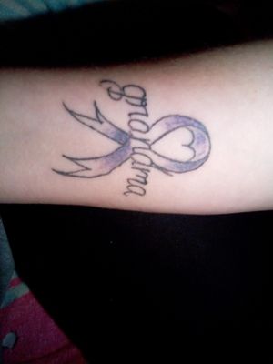 Not finished and the guy didn't do the right color. It's supposed to be teal for ovarian cancer....and for some reason he thought purple and blue made teal. Idk but I want to add butterfly or angel wings and the date my grandma passed away...