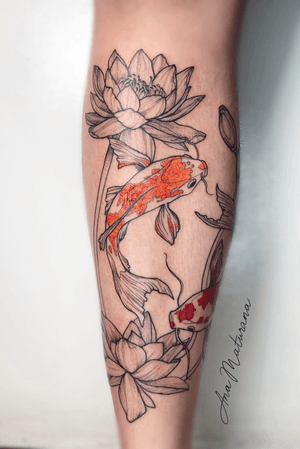 Fish and lotus flower on leg