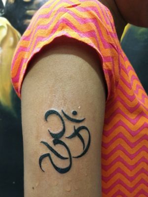 Customized letters with om tattoo