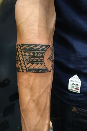 Customized arm band tattoo