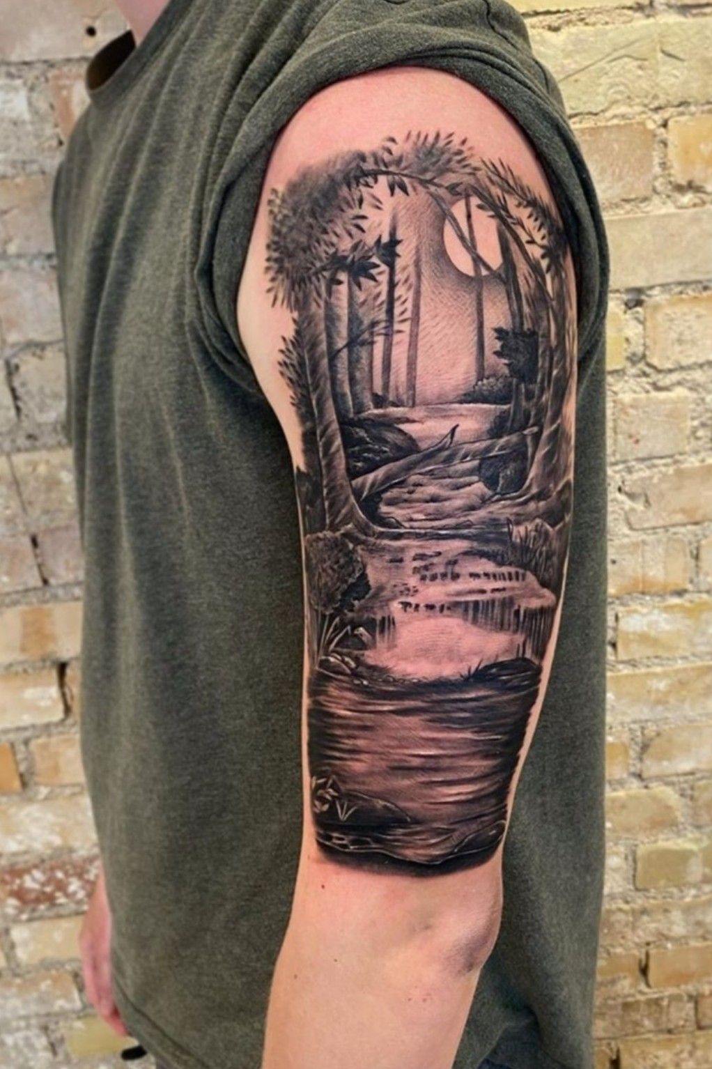 lake scene in tree silhouette  Rites of Passage Tattoo  Silhouette  tattoos Tattoos Body art tattoos