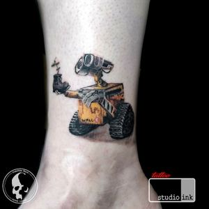 Wall-e tattoo by artist/owner Mark Strong.