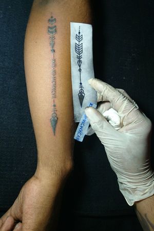 Arrow ➡ with birth date in Roman style Arm Tattoo 
