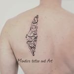 Arabic poem upper back tattoo