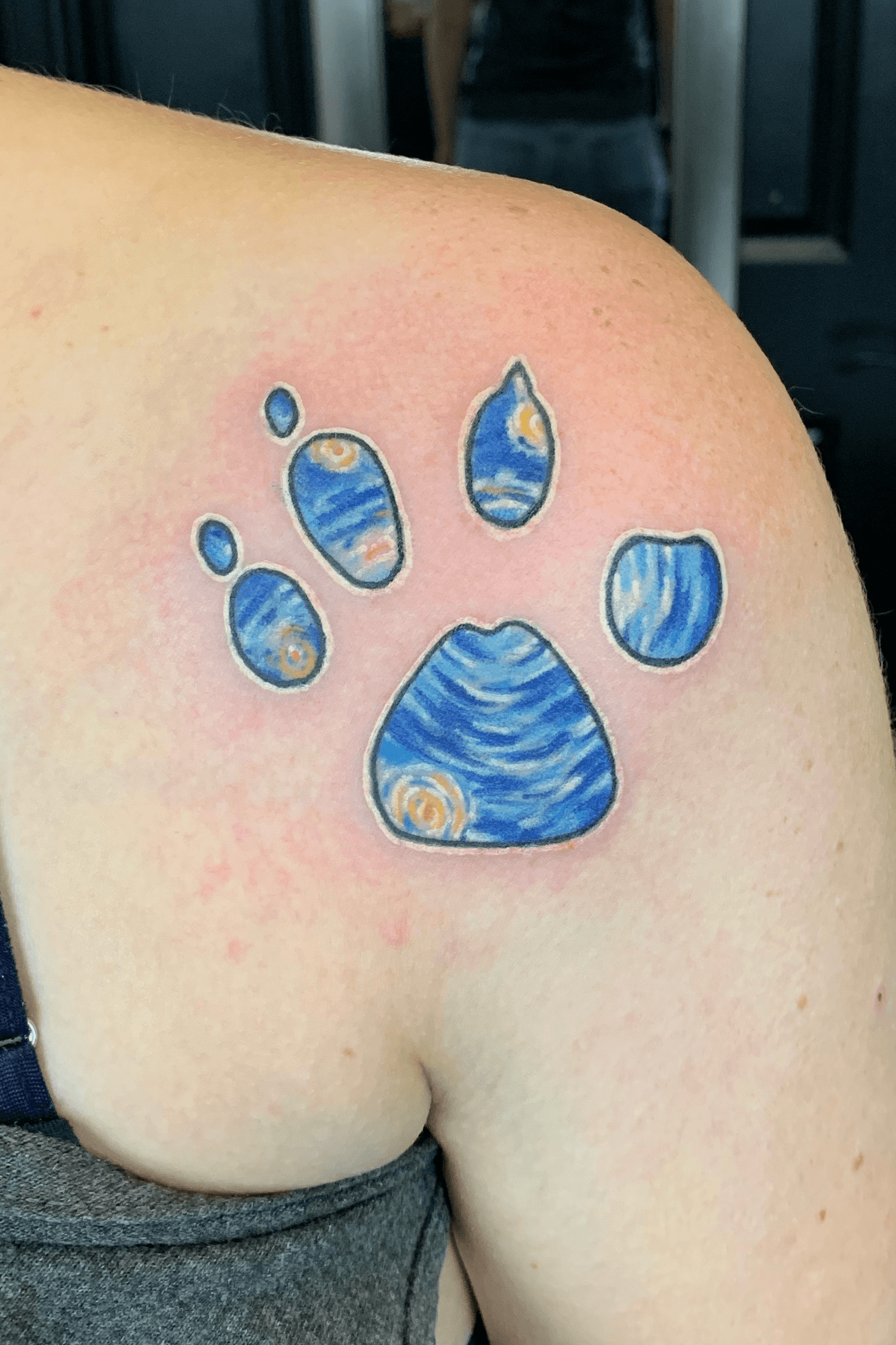 People are Branding Themselves with Dog Paw Tattoos