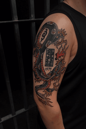 Dragon tattoo around an existing, made by ThankYouTattoo Copenhagen! J.raindog