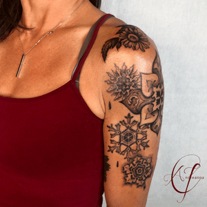 Snowflake tattoo by Andreanna Iakovidis. #snowflaketattoo #blackandgrey #finelinetattoo 