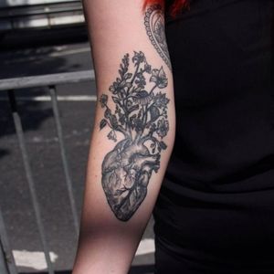 I like the darkness and contrast of this tattoo and the shading