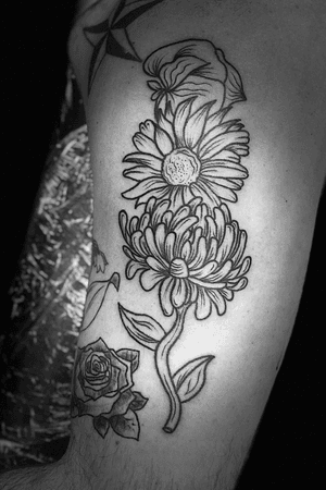 Cool line work flower tattoo