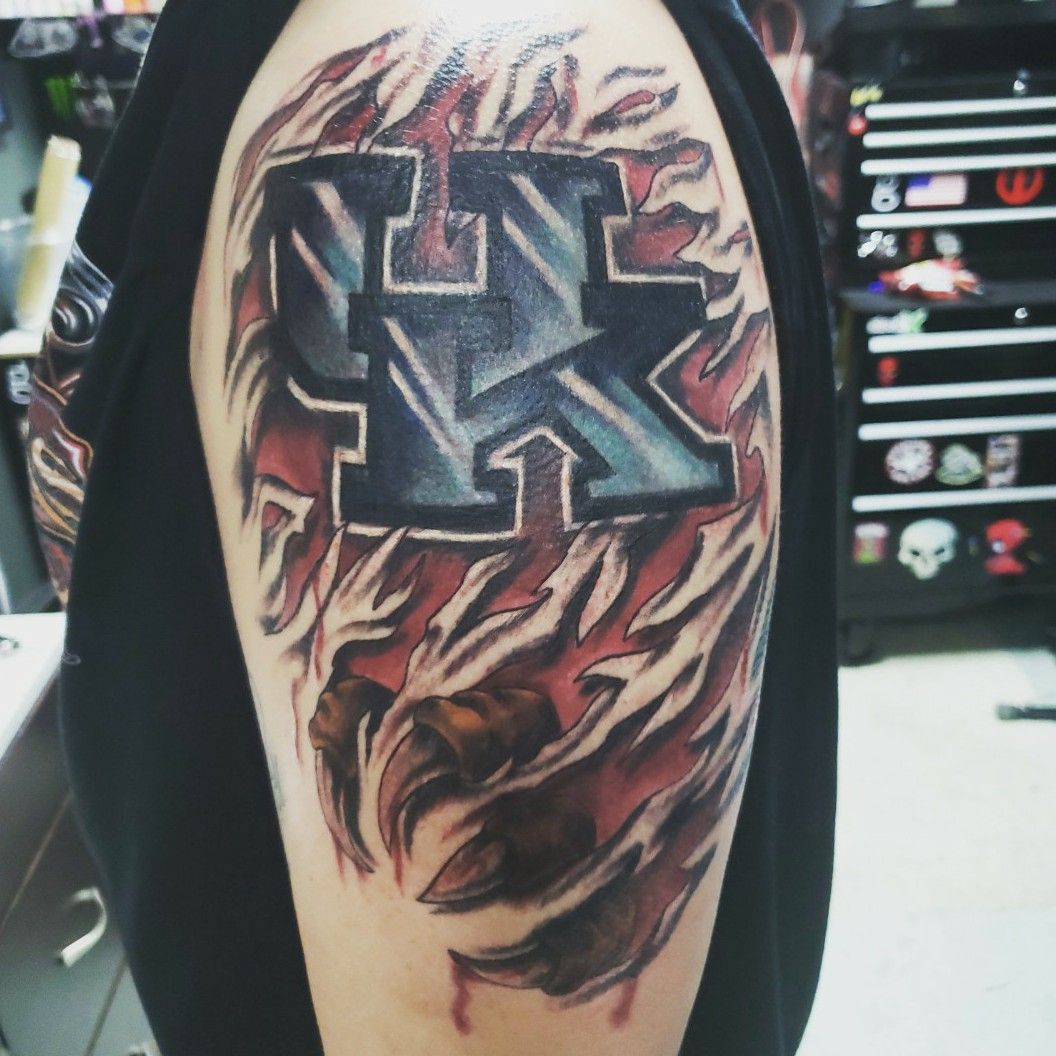 College basketball fan vows to keep tattoo wrongly proclaiming Kentucky  2014 NCAA champions  Herald Sun