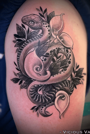 Feminine snake and Cala lily tattoo by Veronica Dey 
