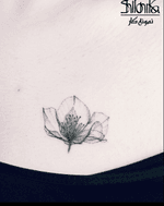 Delicate flower tattoo