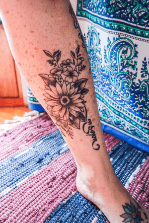 Floral leg tattoo