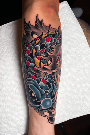 Koi with some flowers and waves