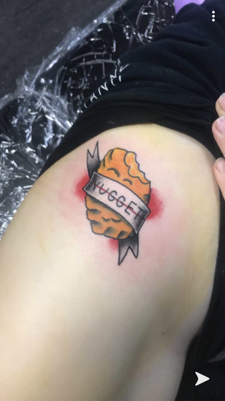 My buddy got a tattoo Its a rabbit holding a chicken nugget riding a  tauntaun holding an XBox controller  rpics