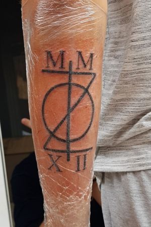 Combination of mine and my best friends initials in Greek and the year we met in Roman numerals 
