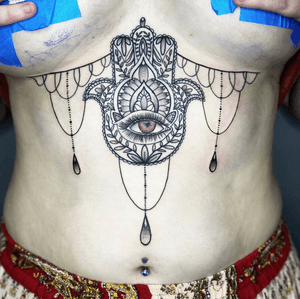 had so much fun for tattooing this beautifu sternum hamsa piece for @keely.lee and you are so brave girl! thanks for your trust 🧡 done at @thedarkessence with @metrixneedles