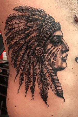 Native American chief tattoo on the ribs