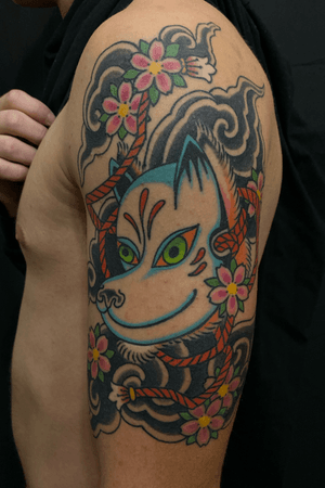 Sly kitsune mask on the arm 