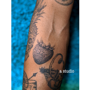 close upstrawberry filler dotwork tattoo.#dotwork #blackwork #fruit