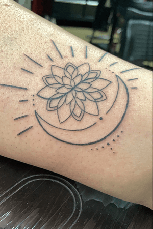 Cresent moon with lotus flower sun 