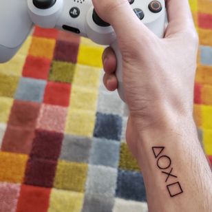 The world is in play! Playstation buttons #playstation #PlayStationTattoos #ps4 #ps3 #ps2 #ps1 