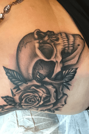 Black and great realistic skull with roses! Big ouchie on this side tat! Part 1