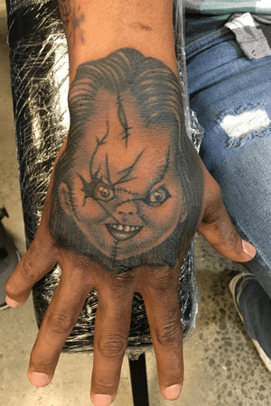 Black and grey Chucky tattoo I made for this guys hand 