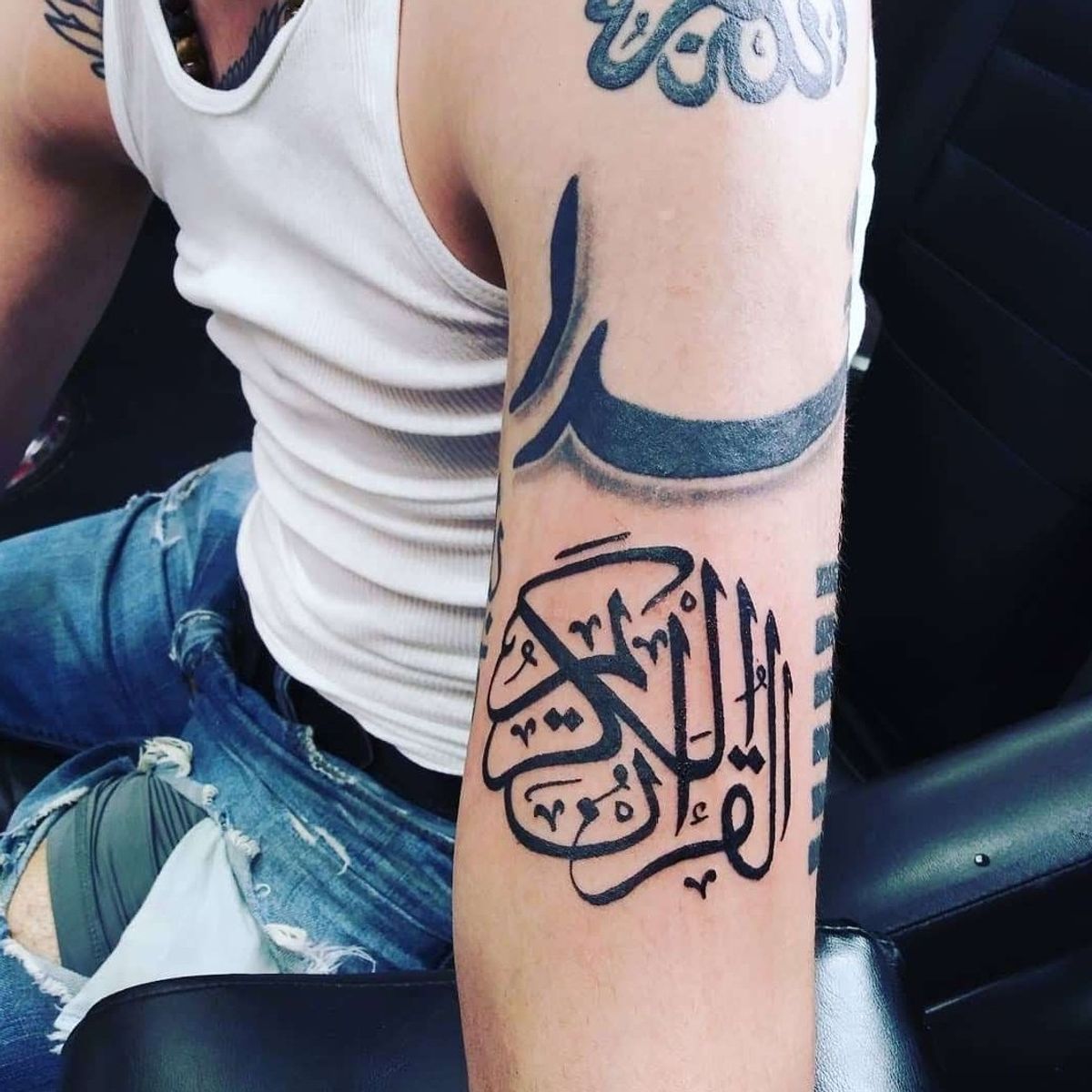 Tattoo uploaded by Hans Forrestal • The book of God in Arabic from the ...