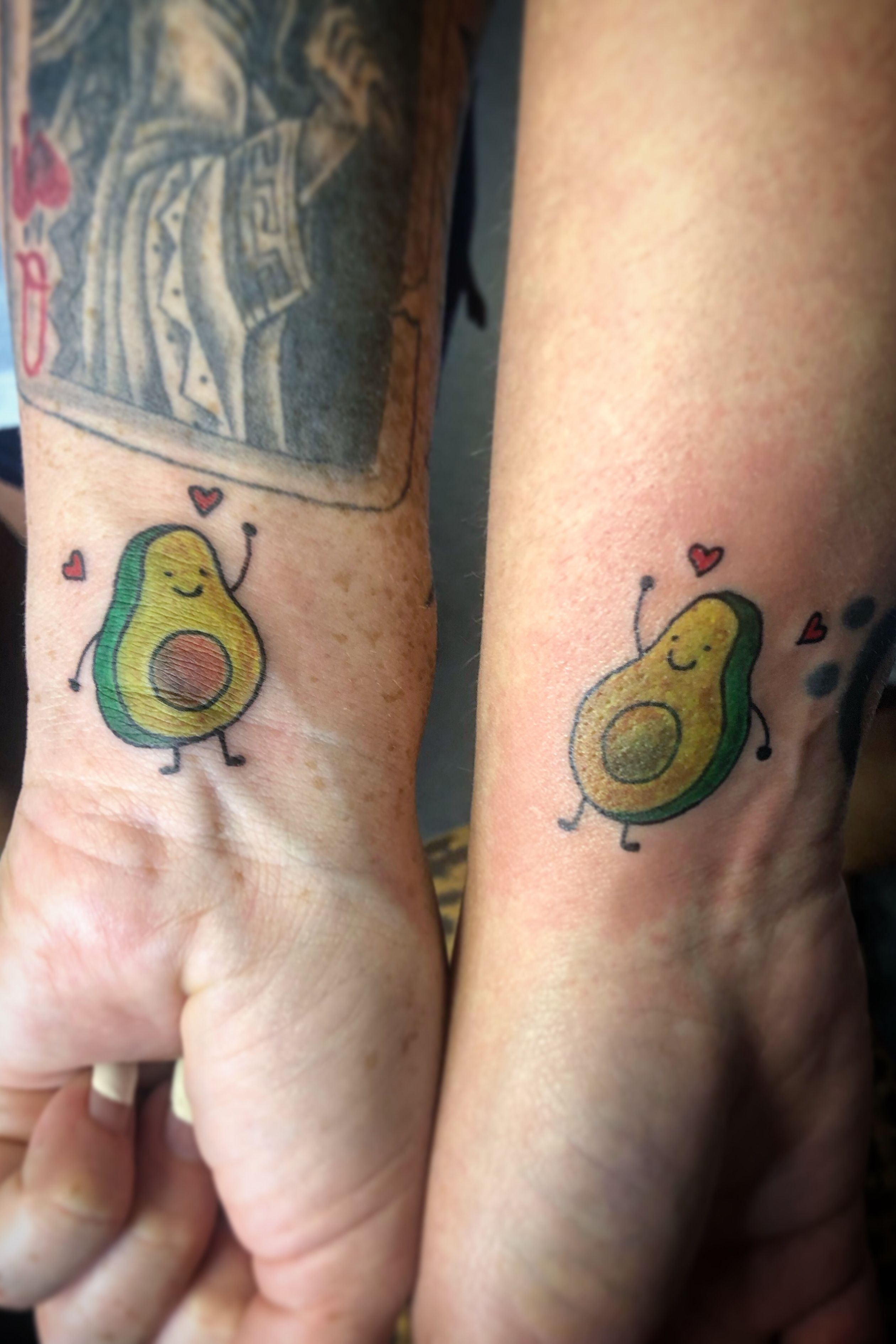 High fiving avocado matching tattoos   Brittany Sue Tattoo  Facebook