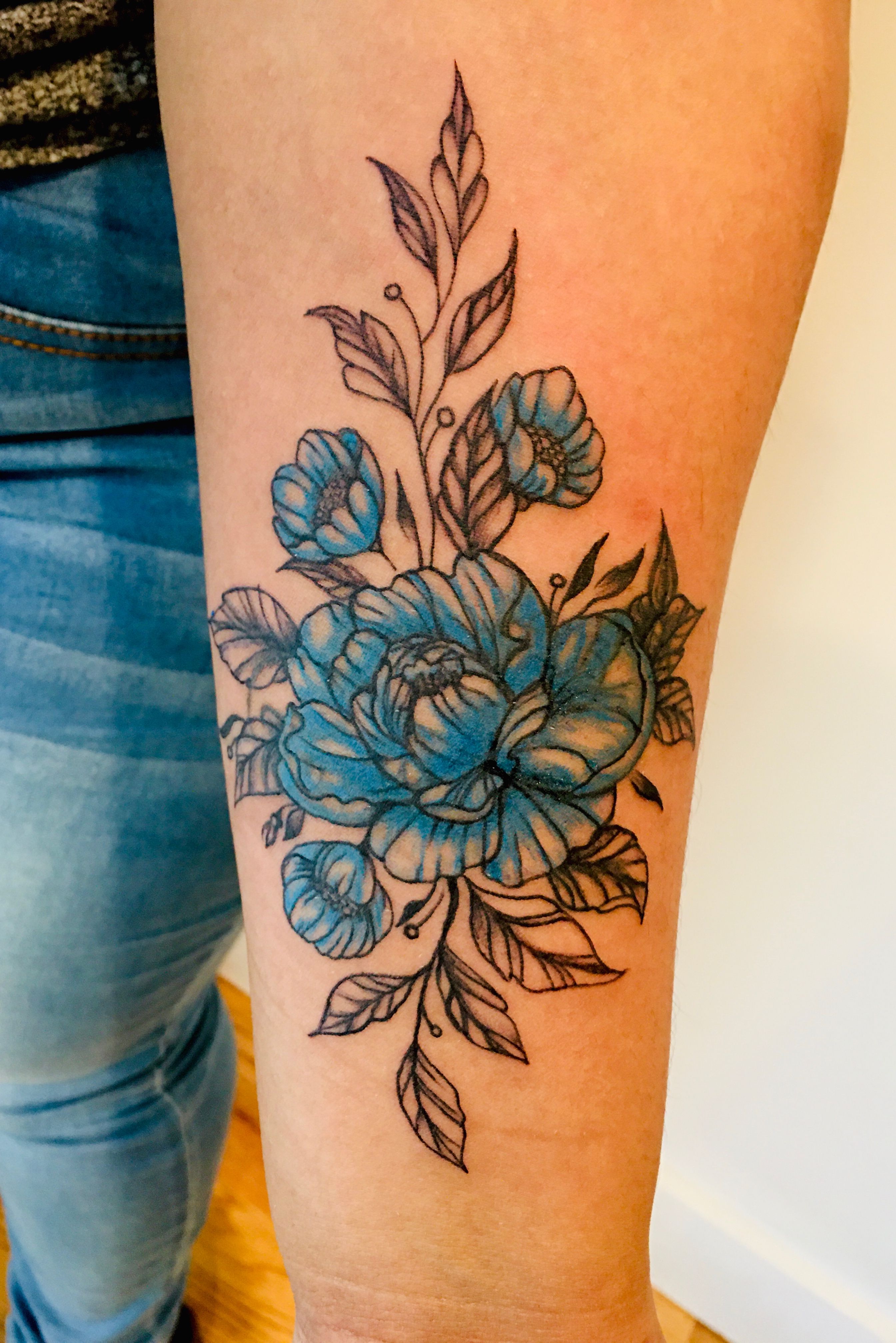 color peony thigh tattoo by Genevieve Dupre: TattooNOW