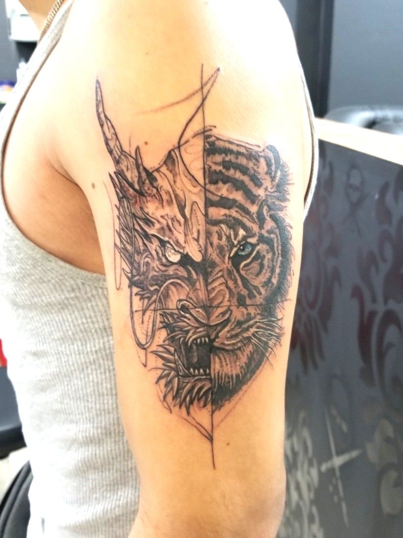 Relic Tattoos by Akhil - Tiger and Dragon tattoo The tiger and dragon are  ancient symbols of yin and yang, forces that combine to make up the  universe. For tattoo inquiries, consultation